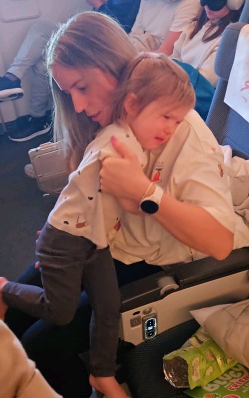 It was at this point in the flight we started to question our life choices..  Travelling with 3 under 3: 10/10 for character building. Meanwhile row 18 is having the sleep of their LIFE. #dadlife #familytravels #adventurefamily #babytravel #3under3 