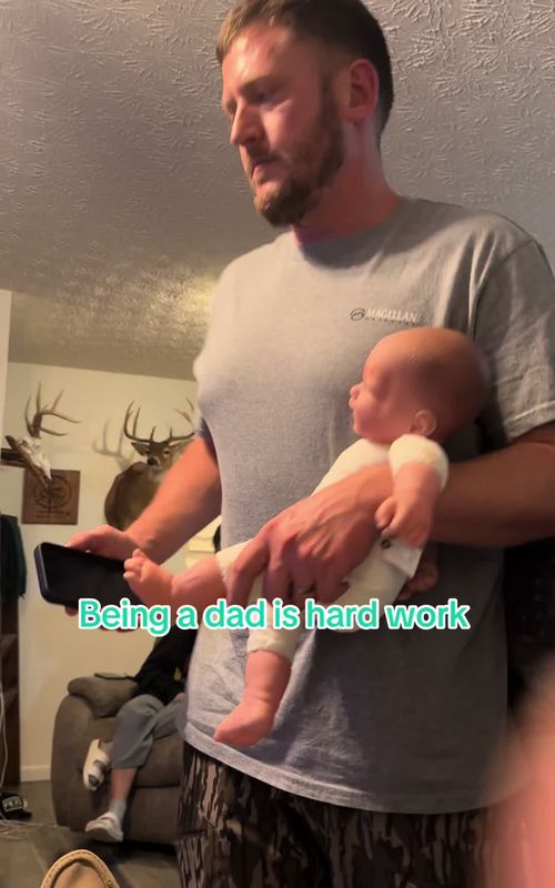 It wasnt until we couldn’t stop laughing that he realized he wasnt holding the real baby 🤦🏻‍♀️🤣#dadlife #babyboy 