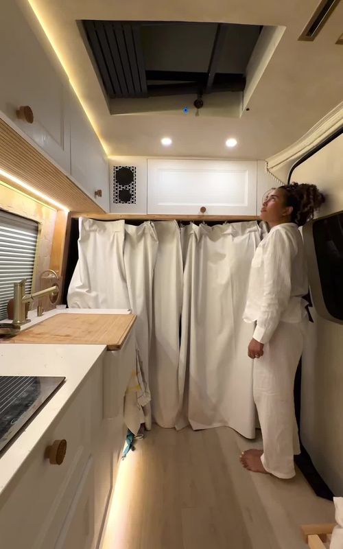 Living full-time in a van can become extremely taxing as you are traveling and living in a tiny space with kids. Finding rhythm and routine is the only way to survive. After the kids go to bed we can declutter, reset and recover 😂 We took more than a year planning and building this van to make daily life comfortable and not over crowded. Having the topper as a separate room for the kids has been a game changer for us as we can still cook, clean, watch our favorite shows. #familyvanlife #vanconversion #lifeontheroad 