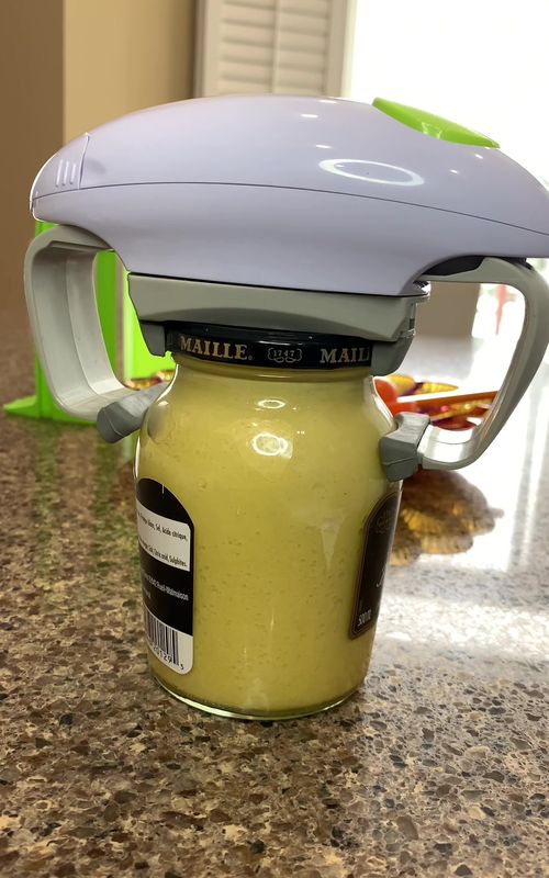 I borrowed this automatic 🫙 opener from my mom. It actually works well. Great for people with arthritis or other physical challenges #automaticjaropener #jaropener #kitchentool #arthritistiktok #buyitorleaveit #usefulgadget 
