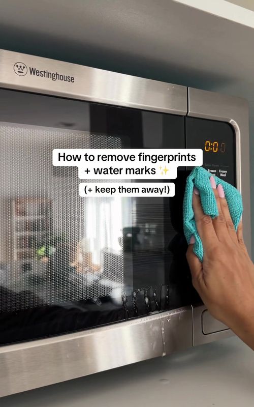The secret weapon to removing fingerprint + water marks from around your home (and actually keeping them away!) ✨ save this for your next deep clean!  Simply mix:  🫧 1 cup water  🫧 1 tbs rinse aid  🫧 2 tbs white vinegar  🫧 1 tbs rubbing alcohol  Spray this mix around your home + wipe dry with a microfibre cloth to leave your home sparkling ✨  Hope this was helpful lovelies xx  #cleaninghacks #cleaningtips #mamamilatips #tipsandtricks #showercleaning 