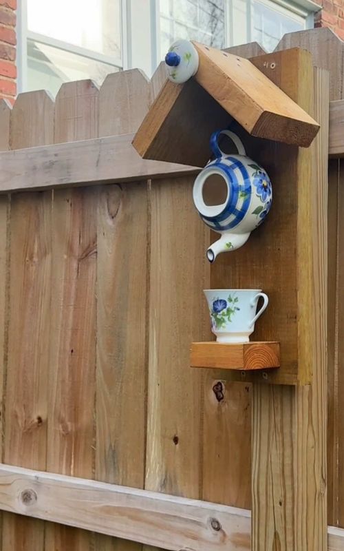 99 cent Goodwill teapot, a lonely teacup, some scrap wood, glue, and a few screws later… we officially have a birdhouse 🐦  #DIYProjectUpcycle #ThriftFlip #GardenDecor #birdtok #birdhouse 