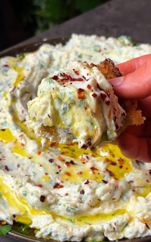 Ultimate Garlic Deep🧄🤤 We love garlic sooooo much we had to make a dip just about it and here it is!🔥 This one is definitely one of our favourites and there is no doubt it will be one of yours too!😍 Ingredients : Garlic  Sesame seeds Olive oil Cream cheese Parsley Salt Red pepper flakes Full measurements and instructions are in our Dip & Devour Cookbook, available by clicking in the link in our bio ✨ Enjoy, Jo and Bart❤️ #garlic #delicious #tasty #FoodTok #Recipe #foodies 