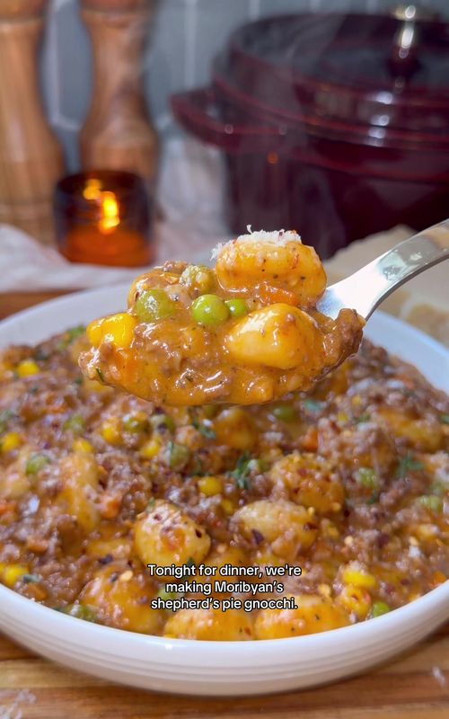 One-Pot Shepherd’s Pie Gnocchi ❤️‍🔥 When @moribyan posted this, I immediately knew I was next. It has everything I love about shepherd’s pie: rich lamb, fresh herbs, and a silky sauce. Normally, shepherd’s pie is a lamb filling topped with mashed potatoes, so using gnocchi here just makes sense. It gives you that same cozy, potato-y element, but everything cooks together in one pan. Ingredients below, full recipe is in my bio!  1 tablespoon olive oil 1/2 yellow onion, finely diced 1 pound ground lamb 2 tablespoons tomato paste @Bionaturae  1/2 teaspoon red pepper flakes, optional 4–6 cloves garlic, minced 1/4 cup dry red wine, optional 3 sprigs fresh thyme, leaves removed and finely chopped (plus more for garnish) 1 sprig fresh rosemary, leaves removed and finely chopped Salt and black pepper, to taste 1 teaspoon Dijon mustard, optional 1 tablespoon Worcestershire sauce 1 1/2 cups beef broth @Kettle and Fire  1 pound shelf-stable gnocchi 1 cup frozen peas and carrots 1/4 cup heavy cream 1 cup finely grated parmesan, to taste #shepherdspie #gnocchi #dinner #easyrecipes #onepanmeal 