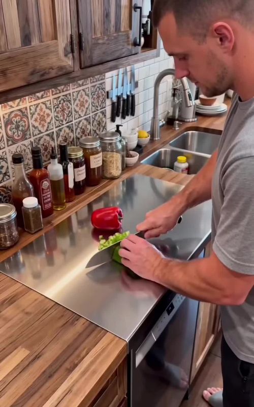 This stainless steel board has become the primary work surface in my kitchen. It's huge, hygienic, and perfect for food prep. #KitchenHacks#kitchengadgets#stainlesssteel#foodprep#tiktokshopcybermonday