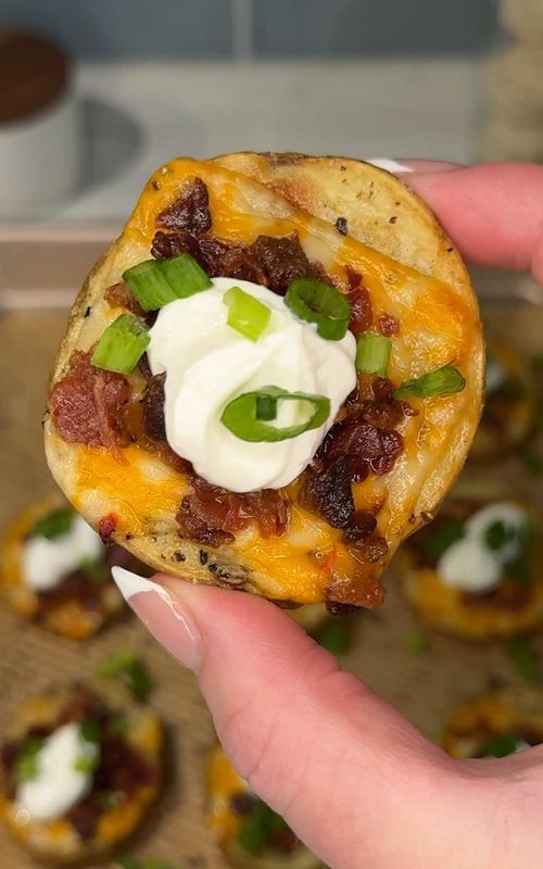these loaded baked potato rounds are so easy and so yummy 🥔🧀🥓 Ingredients: 2 russet potatoes (unpeeled) olive oil 3 slices @Sargento Cheese smoky hot colby jack cheese (quartered) 1/2 cup bacon bits salt + pepper green onions (chopped) sour cream Instructions: Slice potatoes into 1/2-inch rounds and keep skins on. Brush both sides with olive oil and place on a baking sheet. Sprinkle with salt and pepper and bake at 400°F for 20 minutes, flip, then bake another 10 minutes until golden and crispy. Top each round with 1/4 cheese slice and bacon bits, then bake 2–3 more minutes until melted and bubbly. Finish with a dollop of sour cream and a sprinkle of green onions. Enjoy! 😋 #potato #Recipe #appetizer #EasyRecipe #creatorsearchinsights 