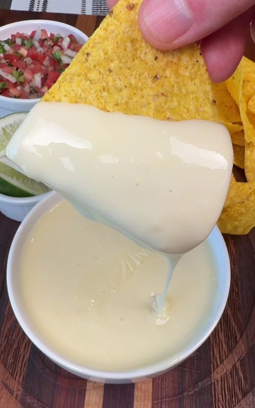 They can’t be mad with a bowl of queso in front of them and if they are you can just take it back 😂  INGREDIENTS 1 lb white American cheese 1/2 cup whole milk  INSTRUCTIONS  Cut 1 lb of American cheese into cubes.  Add the cheese to a skillet. Pour 1/2 cup of whole milk into the pan.  Cook on medium-low heat stirring until the cheese is melted.  Enjoy! #EasyRecipes #cheesedip #queso