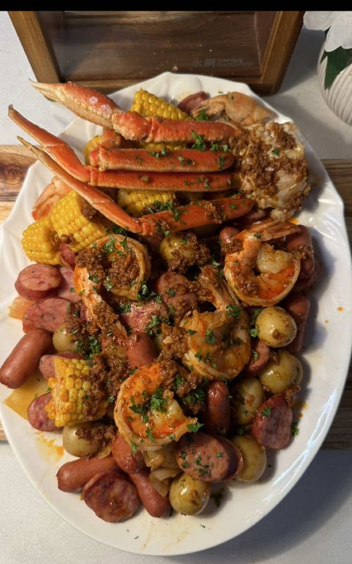 Seafood Boil 🦐🌽🔥 Woke up craving seafood boil today  👀 Boil Seasoning: * 90g Old Bay * ¼ cup paprika * 2 tbsp cayenne * 1 tbsp mustard powder * 2 tbsp kosher salt * 1 tbsp sugar * 2 tbsp black pepper * 2 tsp ground coriander Spicy Butter: * 2 sticks butter * 12 cloves garlic, minced * 2 tbsp boil seasoning * Extra Old Bay + paprika (to taste) ( I added buldak sauce for extra spice but completely optional )  The Boil: * ~5 quarts water (big pot!) * 1 lemon, chopped * 1 onion * 1 head garlic * 2–3 bay leaves * Remaining boil seasoning (adjust to taste) * Salt, to taste Add in: * 2-3 corn (cut) * ~300g baby potatoes * ~3 lbs shrimp * Snow crab clusters * 1 pack smoked sausages  Instructions: 1. Bring the water, lemon, onion, garlic, bay leaves & seasoning to a boil. 2. Add potatoes first, cook until almost tender. 3. Add shrimp + crab, cook just until done (don’t overcook!). 4. Meanwhile, melt butter + garlic, stir in seasoning + extra spices. 5. Add corn, then remove everything from the pot and drizzle on that spicy garlic butter  Serve immediately & get messy 🍋🧈 #creatorsearchinsights #seafoodboil #seafood #cooking #Foodie 