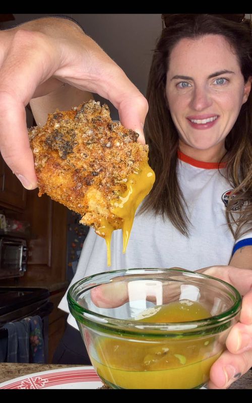 No carb chicken nuggets!  Honestly we loved these and are going to make them again this week!! Ingredients: 1/2 package ground chicken  1 large egg  1/2 cup pork rinds (I used onion & sour cream) Coating: 1 cup crushed pork rinds (I used onion & sour cream) 1/2 tsp garlic powder 1/2 tsp salt 1/2 tsp pepper 1/2 tsp paprika  How to: In a food processor add ground chicken, egg, and 1/2 cup pork rinds. Blend until all mixed together.  In a separate bowl add crushed pork rinds and spices. Mix together. Form chicken nuggets by using 1/4 cup of chicken mixture and dipping it into the coating. Coat on both sides. Place on a parchment lined sheet in the air fryer. Once you form all of the chicken nuggets cook at 400 degrees for 20 minutes flipping half way through.  Serve with your favorite sauce! #lowcarb #porkrinds #chickennuggets #protein #dinnerrecipe 