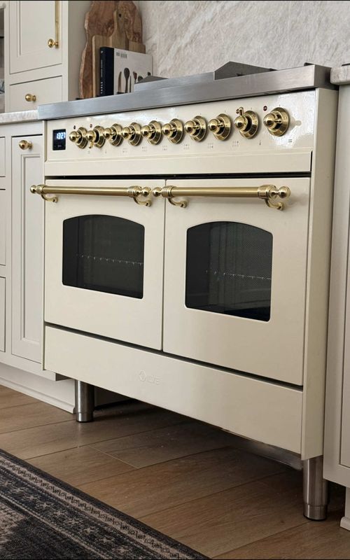 The kitchen range we went with 🤍 We went back and forth on this one, but the details made it worth it — dual ovens, brass burners, and a design that actually elevates the space ) #kitchenrenovation #kitchenrange #kitchendesign #appliances #homedetails 