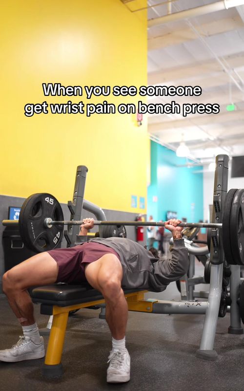 If you're getting wrist pain on bench press, it likely has to do with how you're gripping the bar. Ideally, you want the bar to be resting firmly in the bottom of the palm of your hand and not closer to your fingers.  This will help keep your wrist neutral instead of extended back, which gives you better force transfer and helps avoid wrist pain.  #FYP #Fitness #gym #bodybuilding 
