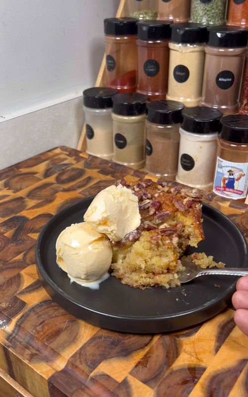 Do Nothing Cake Ingredients For the Cake: •	2 cups all-purpose flour •	2 cups granulated sugar •	2 eggs, room temperature •	1 (20 oz) can crushed pineapple, undrained •	1 teaspoon baking soda •	1 teaspoon vanilla extract For the Topping: •	½ cup butter •	1 cup sugar •	⅔ cup evaporated milk •	½ teaspoon vanilla extract •	¼ teaspoon salt •	1 cup chopped pecans ⸻ Instructions 1.	Prepare the Cake: 1.	Preheat your oven to 350°F (175°C). 1.	In a large bowl, add flour, sugar, eggs, the entire can of crushed pineapple (with juice), baking soda, and vanilla extract. 1.	Mix everything until you have a smooth, creamy batter. 1.	Spray a baking dish thoroughly with nonstick spray. Pour the batter into the prepared dish. 1.	Bake for 30–40 minutes, or until a knife inserted in the center comes out clean. 2.	Make the Topping: 2.	While the cake cools, place butter, sugar, evaporated milk, vanilla extract, salt, and chopped pecans in a pot. 2.	Heat over medium, stirring, until the mixture thickens (about 3–5 minutes). 3.	Assemble: 3.	Once the cake has cooled a bit, use a fork or skewer to poke holes all over the top of the cake. 3.	Pour the warm topping evenly over the cake, letting it soak into the holes. 3.	Serve warm and enjoy! ⸻ #DoNothingCake #EasyDessert #HomeBaking #PineappleCake #SouthernRecipes