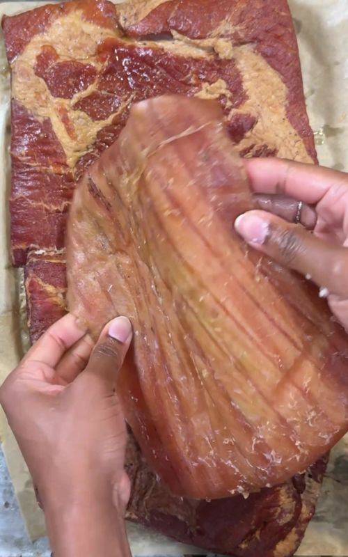 Homemade bacon is one of those things that sounds complicated… but it’s actually really simple. It does take time, but the flavor and quality you get at the end? 100% worth it. I’ve been making my own bacon for years, but this time I decided to try a recipe from Jess Pryles and it turned out so good. Here’s the ingredient breakdown from her recipe: Ingredients (Jess Pryles Recipe): • 9 lb skinless, boneless pork belly • 9 tbsp kosher salt • 1 cup white sugar • 6 tbsp pepper • 6 tsp paprika • 3 tsp pink curing salt (Prague Powder #1) • Apple or cherry wood chunks/chips (for smoking) If you want my personal version, plus the full step-by-step and my exact process, you can find all of the info in my bio link and the full it will lead you to the full YouTube video where I break everything down. #bacon #homemadebacon #EasyRecipes 