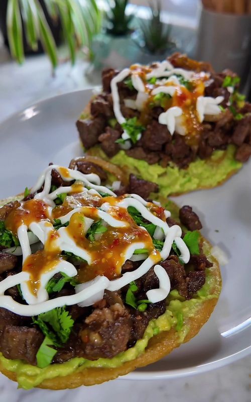 🥩🔥 Carne Asada Tostadas 🤤 Easy, quick, and SO delicious 😮‍🔥 Perfect for a simple homemade meal! ⸻ 📝 Ingredients * Beef (boneless chuck steak, diced) * Carne asada seasoning * ½ onion (sliced) * Oil Toppings: * Guacamole * Onion & cilantro (finely chopped) * Sour cream * Spicy salsa Other: * Corn tortillas (for tostadas) ⸻ 👩‍🍳 Instructions 1️⃣ Dice the beef and season with carne asada seasoning. Mix well. 2️⃣ Heat oil in a pan and cook the onion, then add the meat and cook until nicely browned. 3️⃣ While the meat cooks, prepare the guacamole and chop onion and cilantro. 4️⃣ Fry the tortillas in oil until crispy to make tostadas. 5️⃣ Assemble: add a layer of guacamole, then the meat, onion, cilantro, sour cream, and salsa. ⸻ 🤤 So easy and full of flavor! 💬 What do you think? Have you tried them? What would you add? 👀🔥 ⸻ 🥩🔥 Tostadas de Carne Asada 🤤 Fáciles, rápidas y deliciosas 😮‍🔥 Perfectas para una comida casera. ⸻ 📝 Ingredientes * Carne de res (bistec en cuadritos) * Sazonador para carne asada * ½ cebolla en julianas * Aceite Para servir: * Guacamole * Cebolla y cilantro picado * Crema agria * Salsa picosa Otros: * Tortillas de maíz (para tostadas) ⸻ 👩‍🍳 Paso a paso 1️⃣ Pica la carne y sazónala con el sazonador. Mezcla bien. 2️⃣ En una olla con aceite, fríe la cebolla y después agrega la carne hasta que quede doradita. 3️⃣ Mientras, prepara el guacamole y pica la cebolla y el cilantro. 4️⃣ Fríe las tortillas hasta que queden crujientes. 5️⃣ Arma tus tostadas: una capa de guacamole, carne, cebolla, cilantro, crema y salsa. ⸻ 🤤 ¡Quedaron buenísimas! 💬 ¿Qué opinan? ¿Las han probado? ¿Qué le agregarían? 👀🔥 #tostadas #mexicanfood #EasyRecipe #recipes #steak 